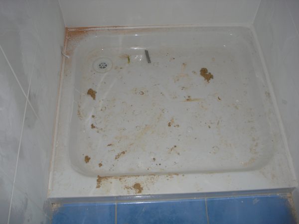 The brand new shower tray that the customer is paying for